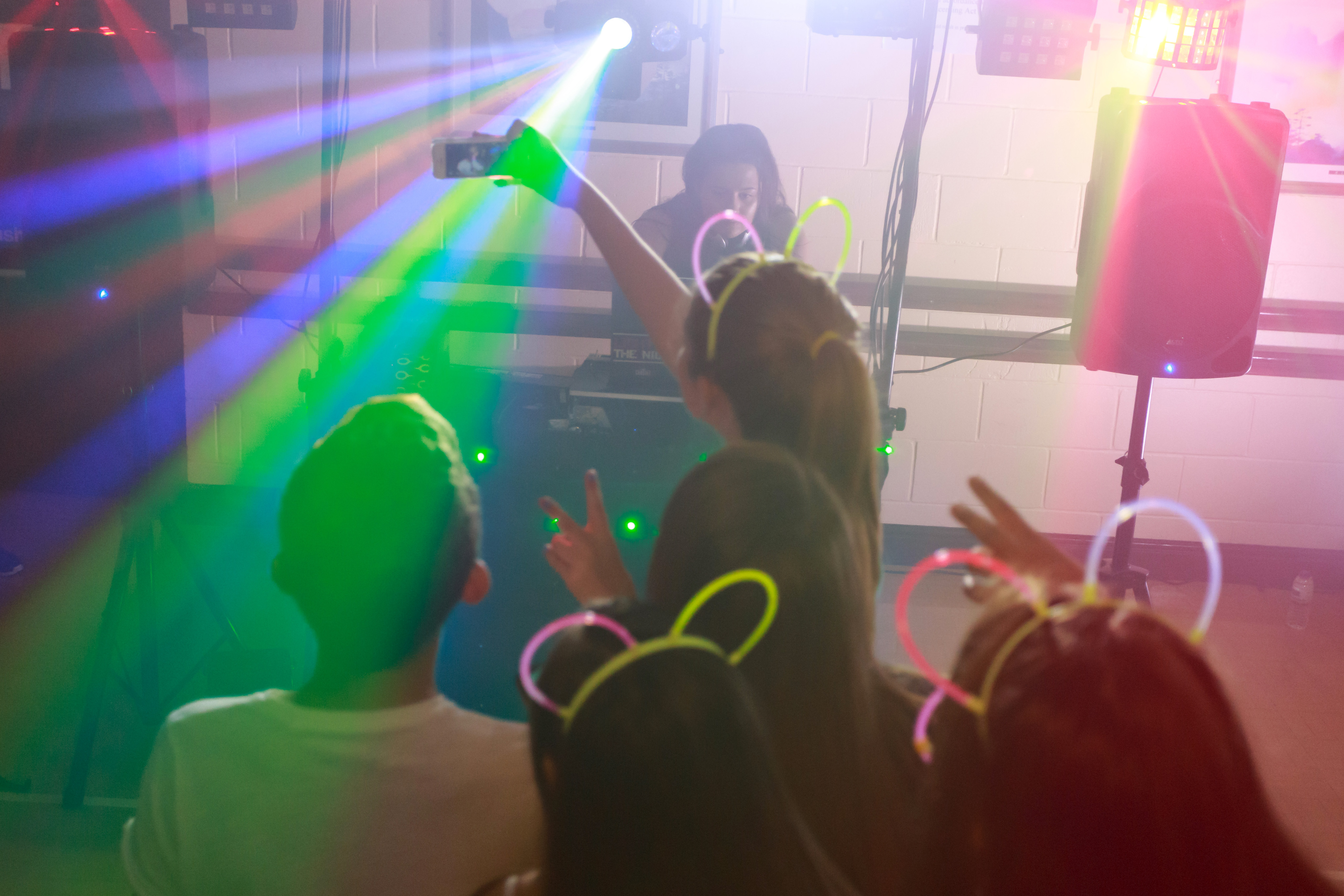 Teenage glow party with light show