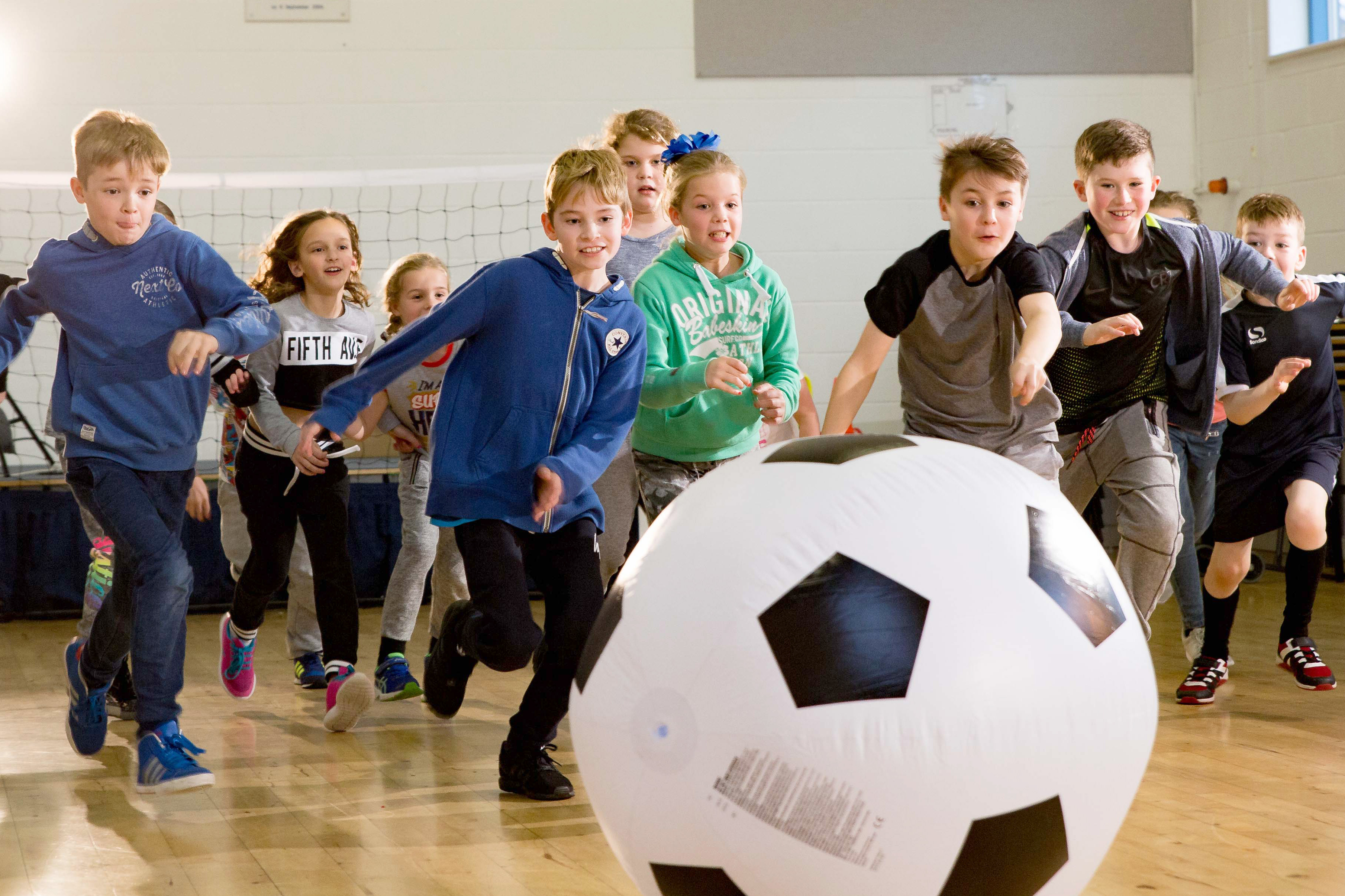 Football themed party with giant inflatable ball